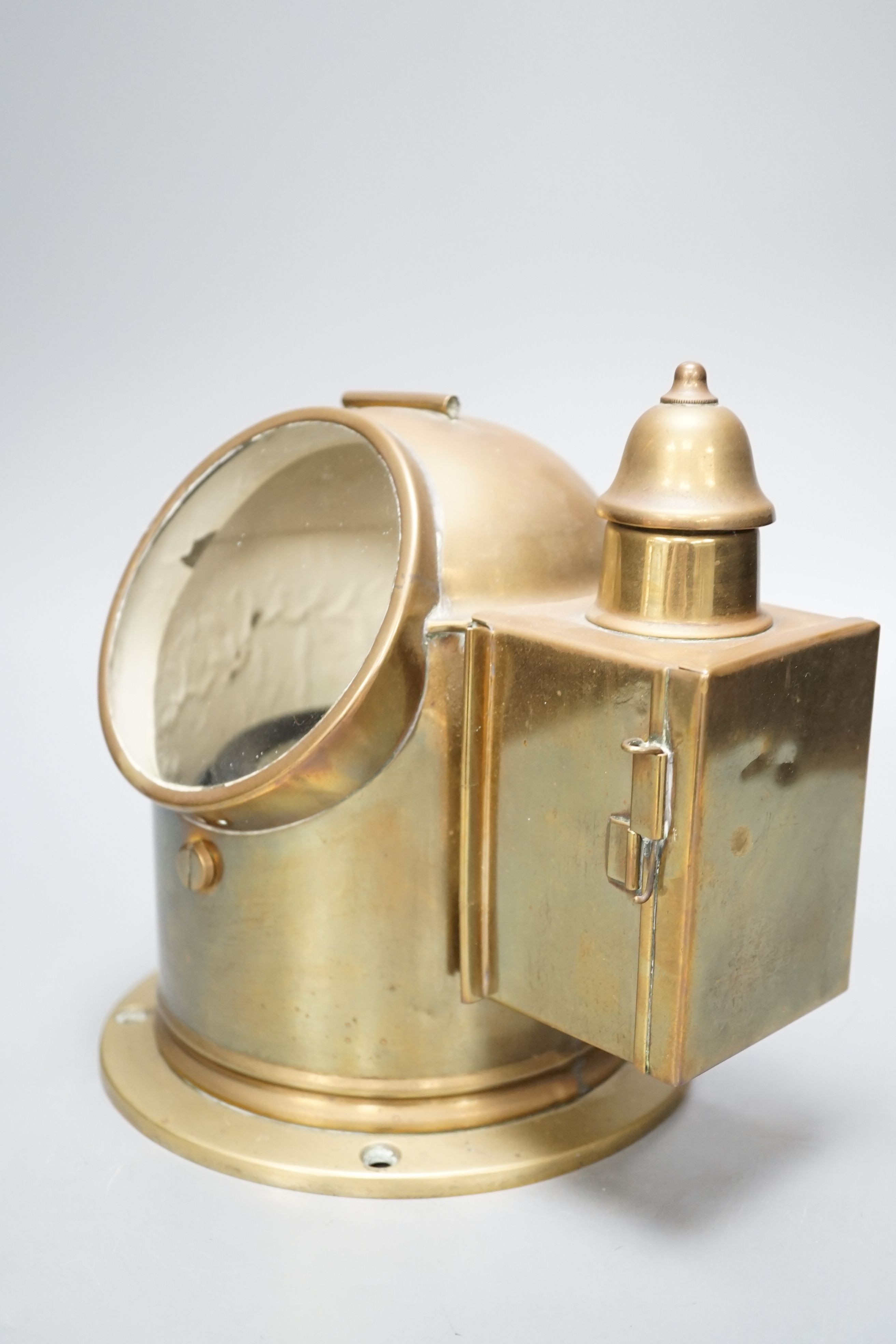 A brass ship's binnacle compass, 22cms wide x 22 cms high.